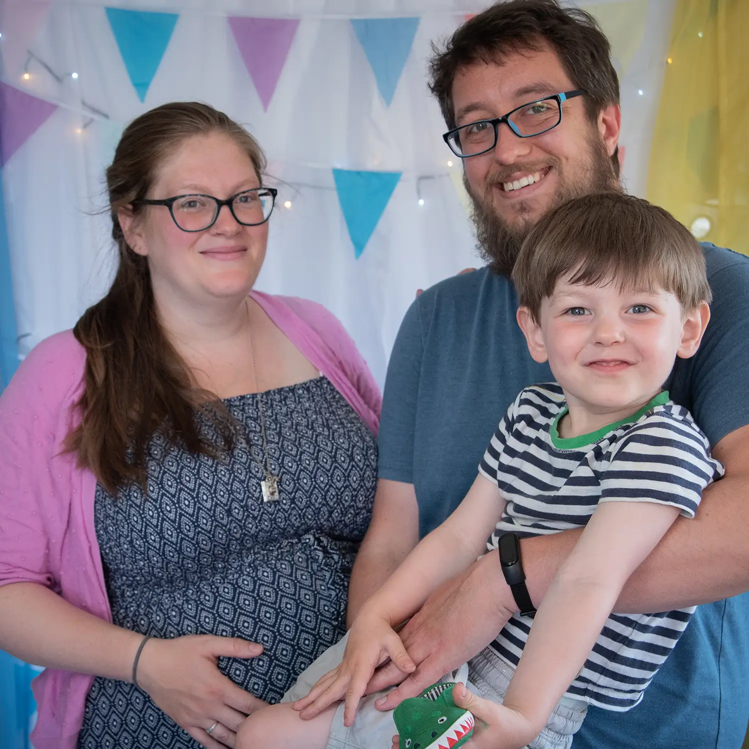 Pregnant mum with her young family